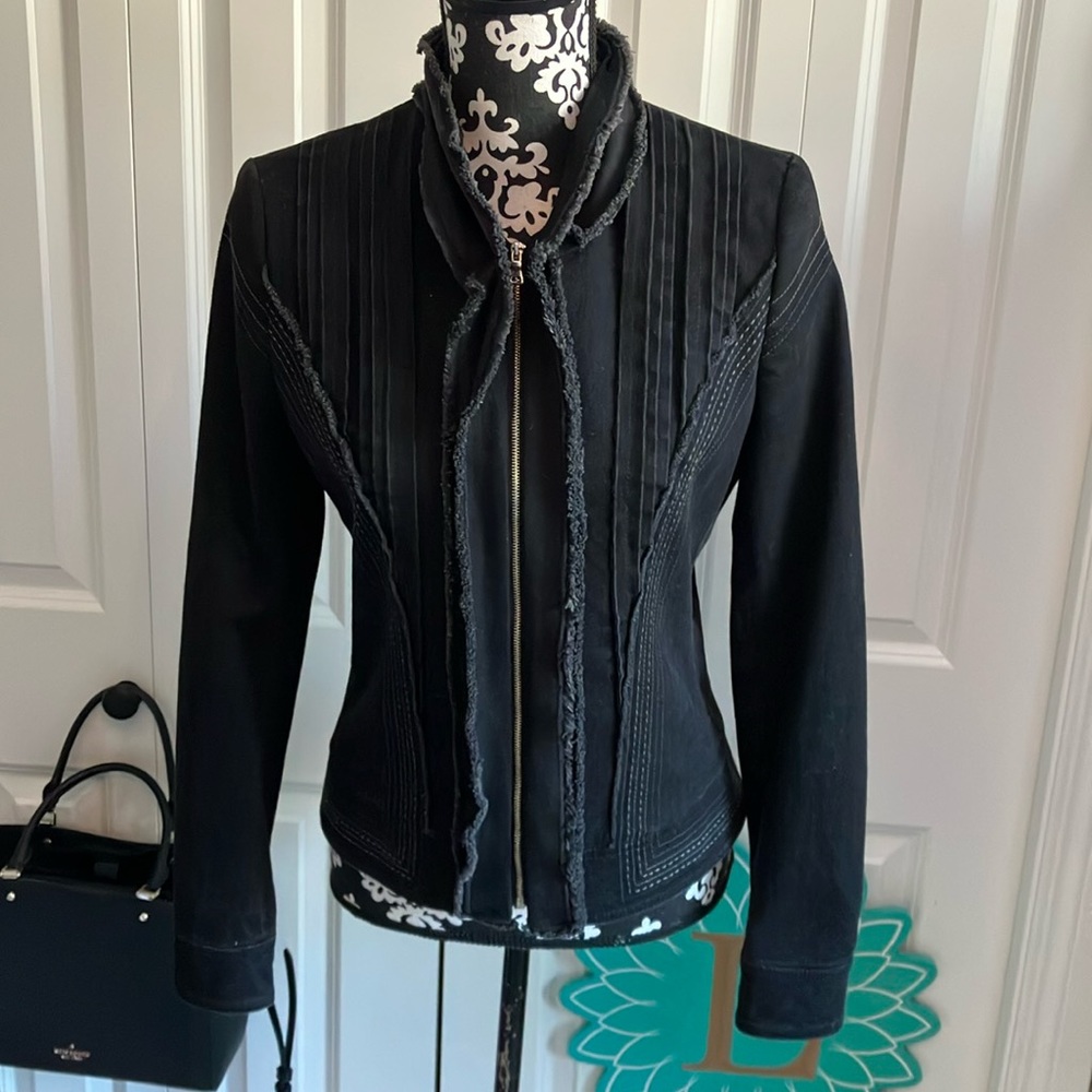 Fabulous blackish gray denim jacket with great stitch detail and frayed edges